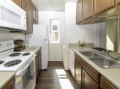 Thumbnail 3 of 34 - Fully Equipped Kitchen at Eucalyptus Grove Apartments, Chula Vista, California